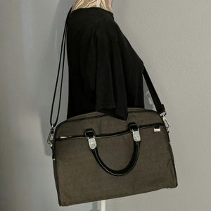 Slim Tumi computer travel messenger bag.